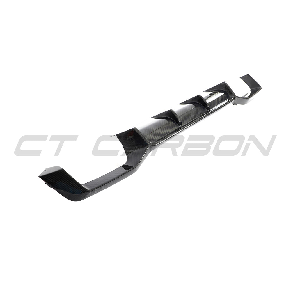 BMW G02 X4 and F98 X4M full carbon fibre kit by CT Carbon, showing detailed carbon fibre components on the car.
