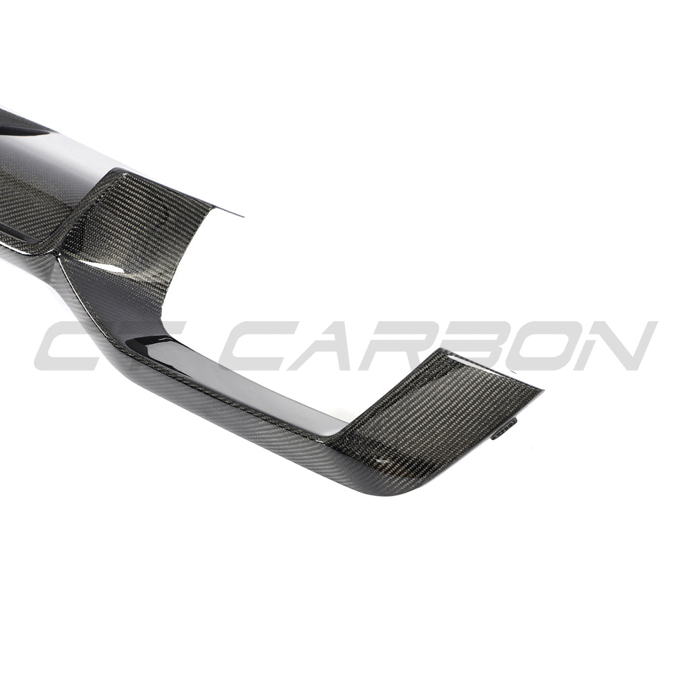 BMW G02 X4 and F98 X4M full carbon fiber kit by CT Carbon, showing close-up of carbon fiber panels and detailed finishing.