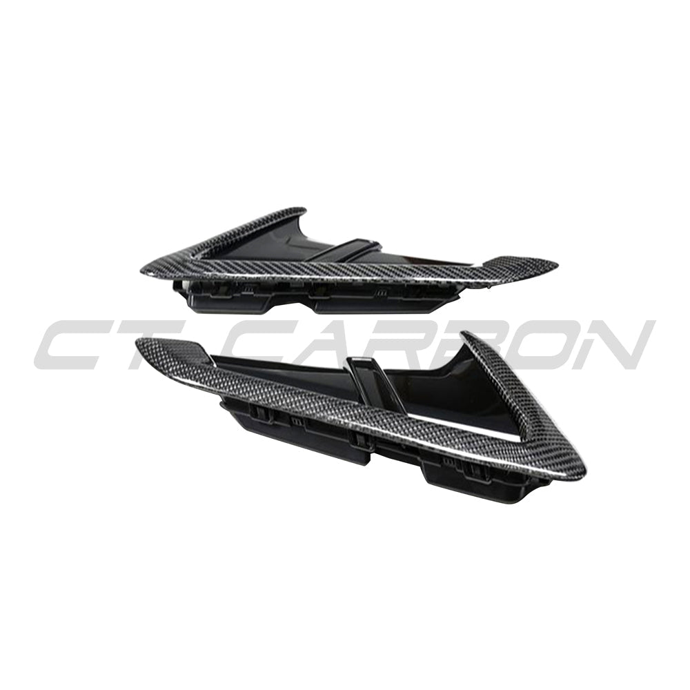 BMW G01/G02 X3/X4 and F97/F98 X3M/X4M carbon fibre fender trim accessory by CT Carbon, shown on vehicle exterior.