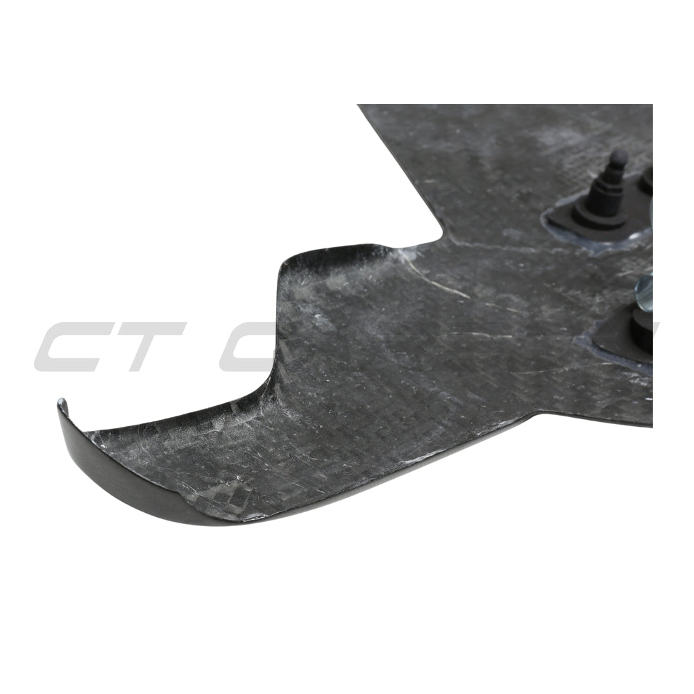 Carbon fiber lower engine bay cover for BMW F90 M5 and M8 models by CT Carbon, showcasing the sleek textured surface.
