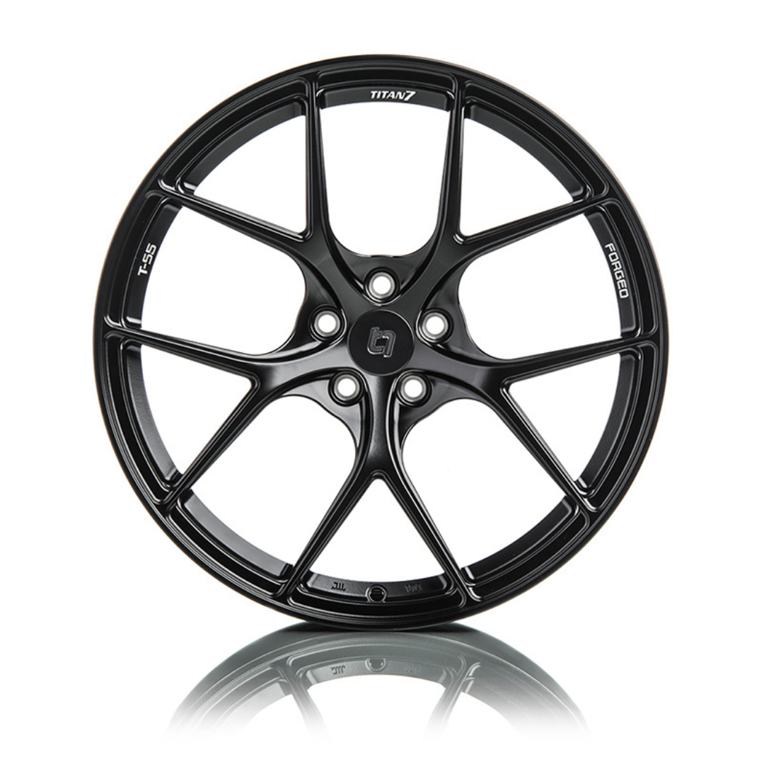 Titan 7 T-S5 forged 5-spoke alloy wheels, black finish, lightweight design, wheel close-up showing spoke pattern and rim details.