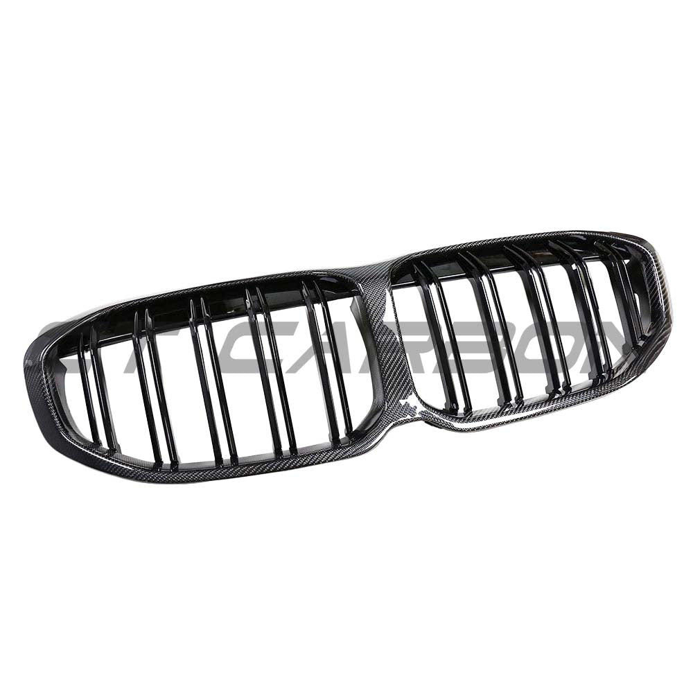 BMW F40 1 Series 2019-2024 carbon fibre front grille by CT Carbon, showcasing sleek, lightweight design and detailed craftsmanship.