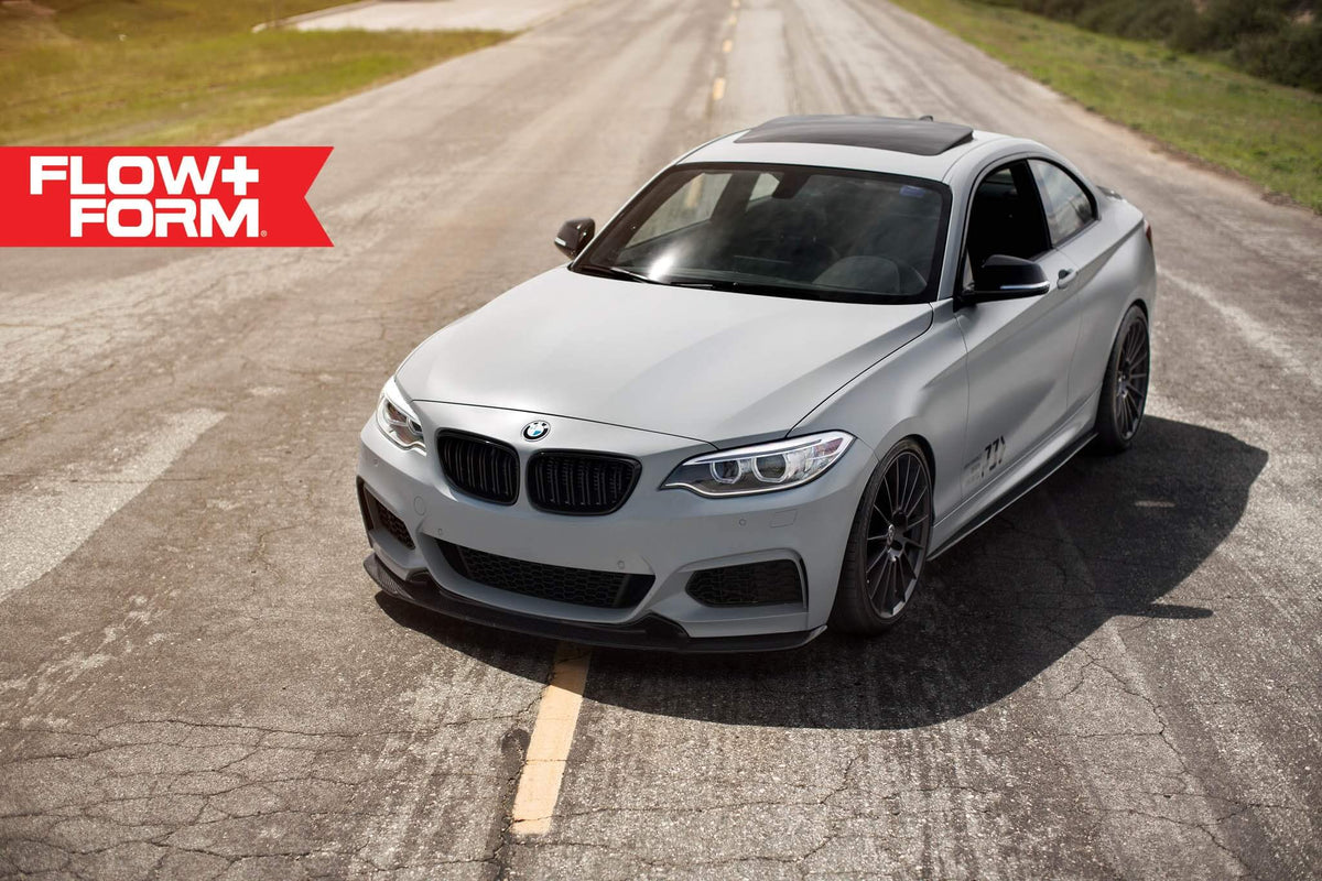 HRE PERFORMANCE WHEELS FF15 alloy wheels with a sleek, multi-spoke design displayed on a vehicle.