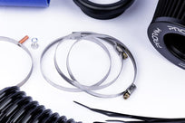 Ramair Proram induction kit with blue hoses for VW MK5 R32, featuring air filters and high-performance intake components.
