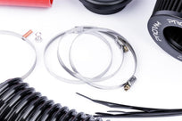 Ramair Proram Induction Kit for VW MK5 R32 with red hoses, featuring high-performance air intake components and branding.