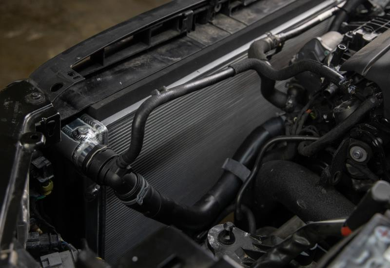 MISHIMOTO aluminum performance radiator for Volkswagen MK7 Golf TSI/GTI 2015+, featuring a 300mm core and sleek design.
