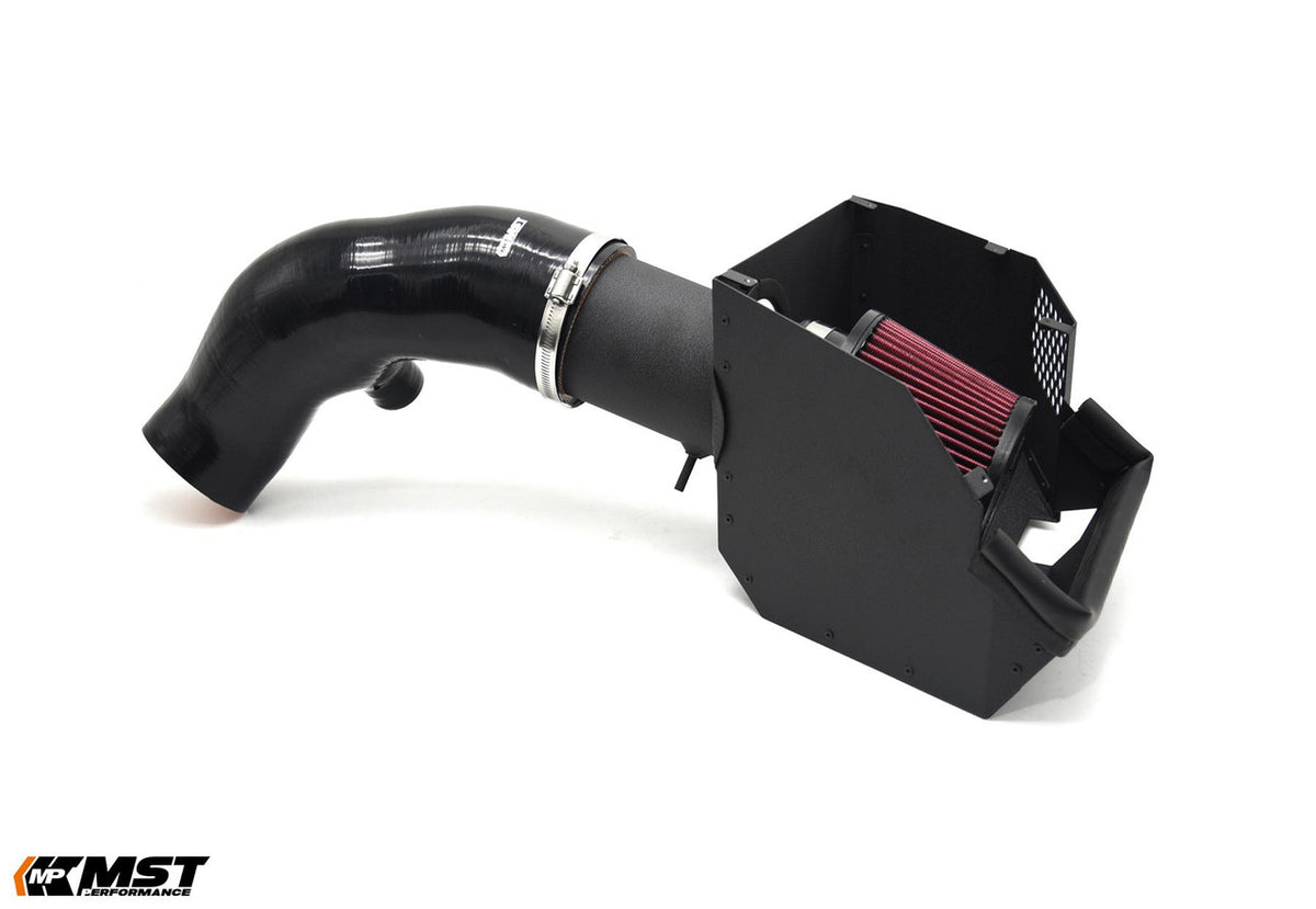 MST Performance induction kit for MK8 Golf EA888 EVO showing polished intake piping and air filter for enhanced engine airflow.