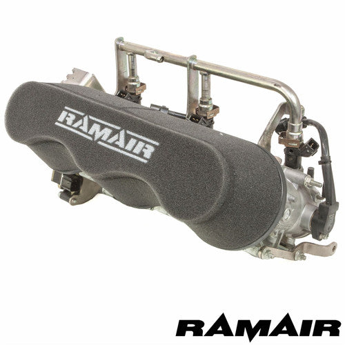 Ramair Triumph Rocket 3 air filter induction kit shown with high-performance air filter and intake components on a motorcycle engine.