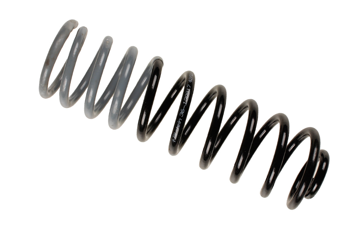 Bilstein B3 OE replacement coil spring for Volkswagen Passat Variant 35i, part number 36-130917, showing the spring's coils.