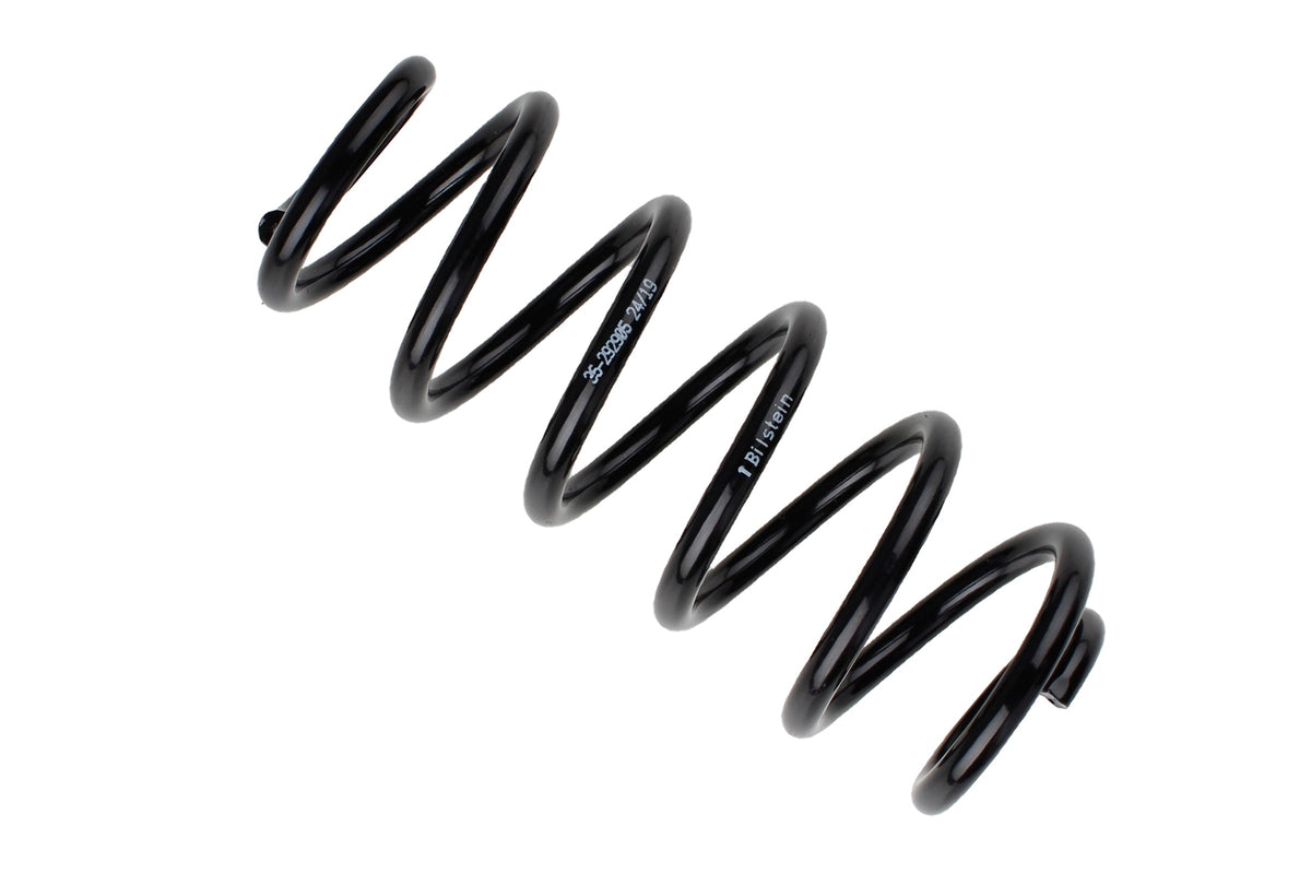 Bilstein B3 rear coil spring for Volkswagen Golf VII, showing the black metal coil spring with coil wrap details.