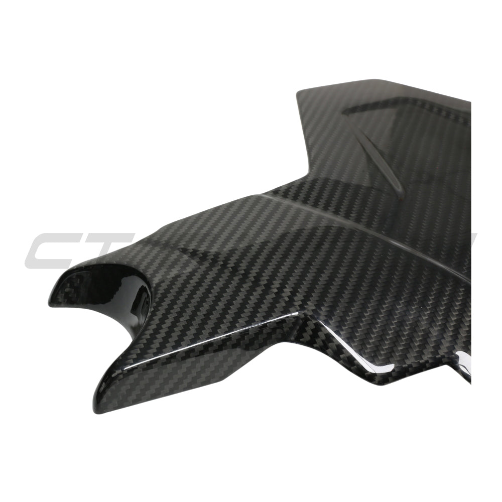 BMW F90 M5 and M8 carbon fiber lower engine bay cover by CT Carbon, showcasing the sleek, lightweight engine bay accessory.