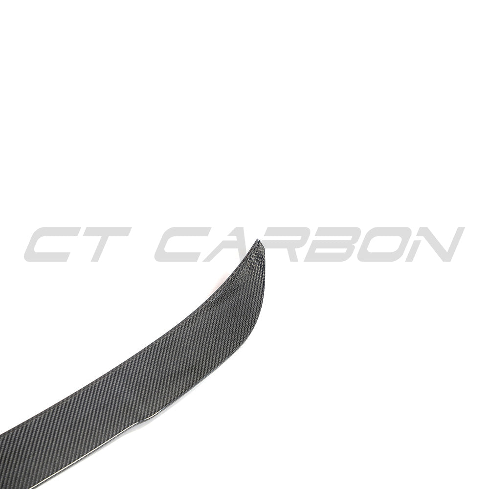 BMW G02 X4 and F98 X4M full carbon fiber kit by CT Carbon, showcasing lightweight, high-quality carbon fiber components on the car.