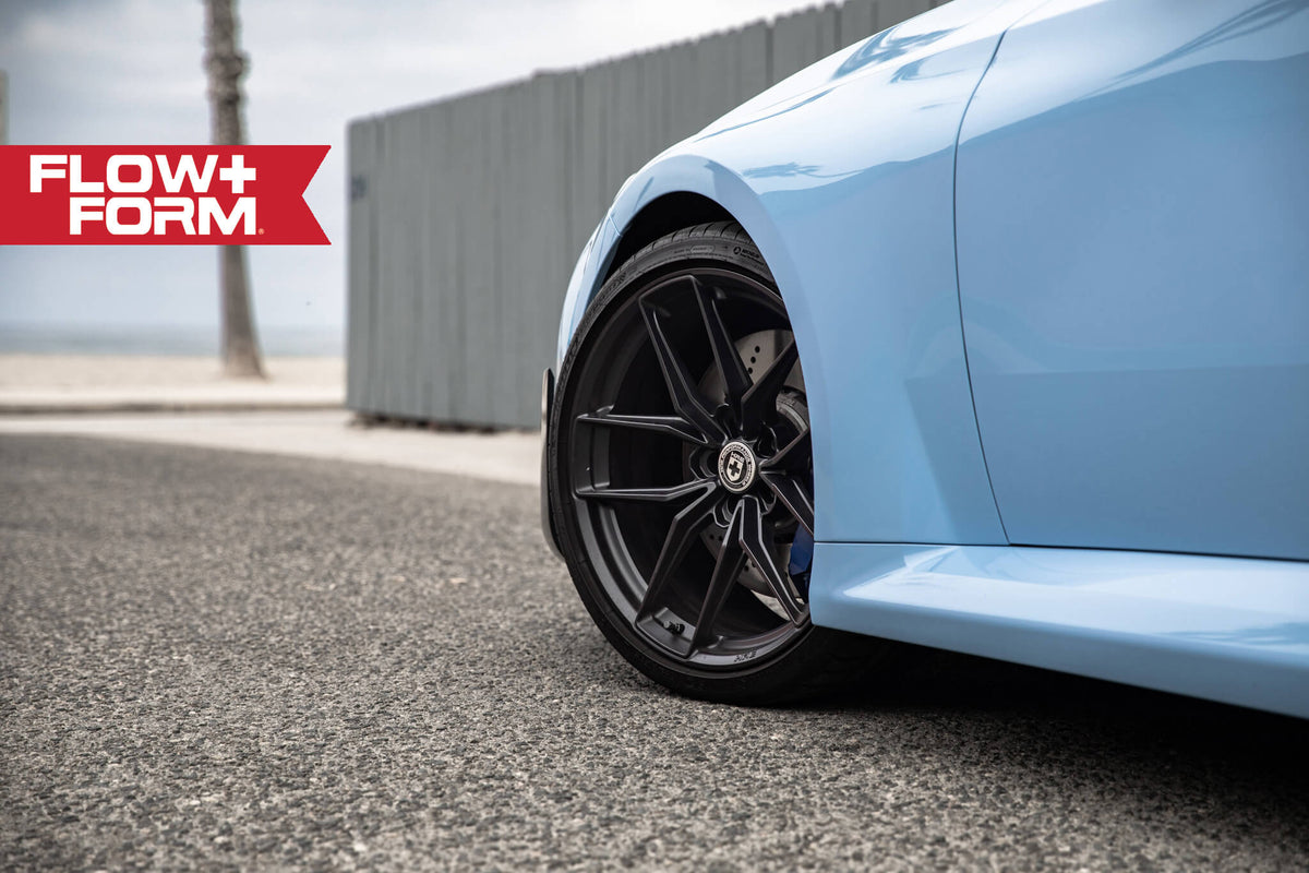 HRE PERFORMANCE WHEELS FF21 alloy wheels with multi-spoke design and polished finish, shown on a vehicle.