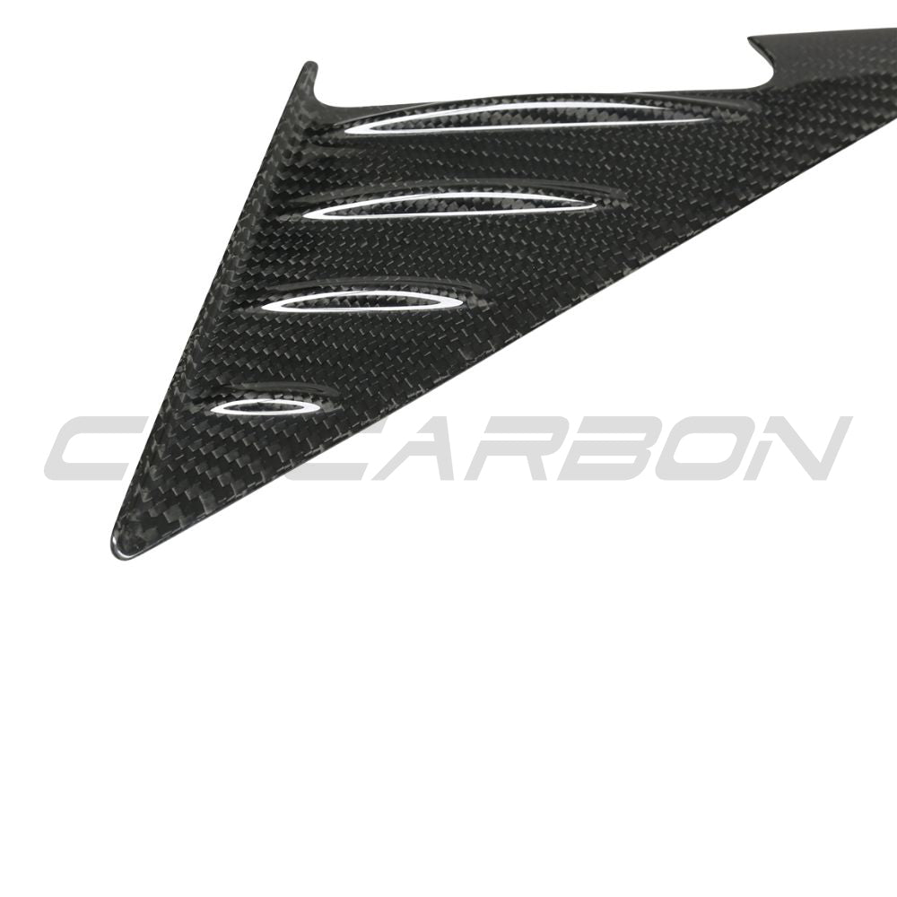 BMW M3 and 3 Series G80/G81/G20/G21 carbon fibre mirror pillar trim by CT Carbon, close-up view of sleek, textured accessory.