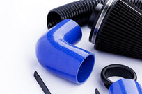Ramair ProRam induction kit with blue hoses for VW MK5 R32, featuring branded air filters and silicone hoses in the image.