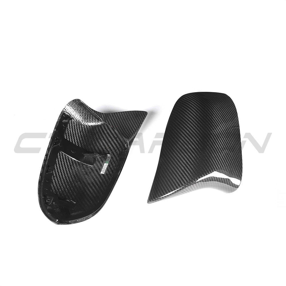 Carbon fiber side mirrors for BMW X5/X6 F15/16 2014-2019 by CT Carbon, showing sleek, lightweight mirror shells with reflective glass.