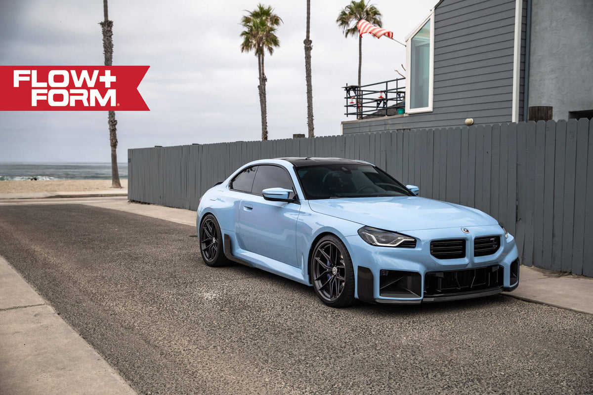 HRE PERFORMANCE WHEELS FF21 alloy wheels with five-spoke design, polished finish, and intricate detailing on a vehicle wheel.