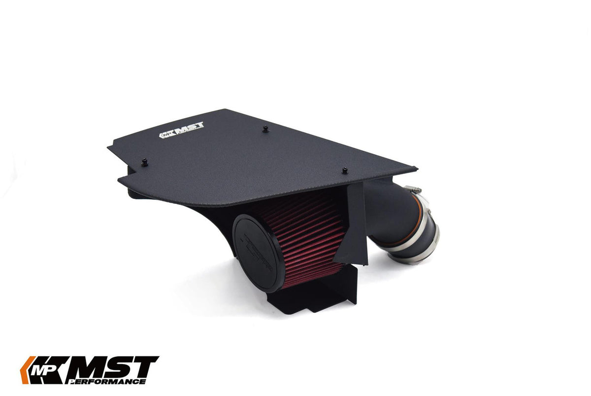 MST Performance induction kit for BMW B58 540i showing air intake components and tubing in a close-up view