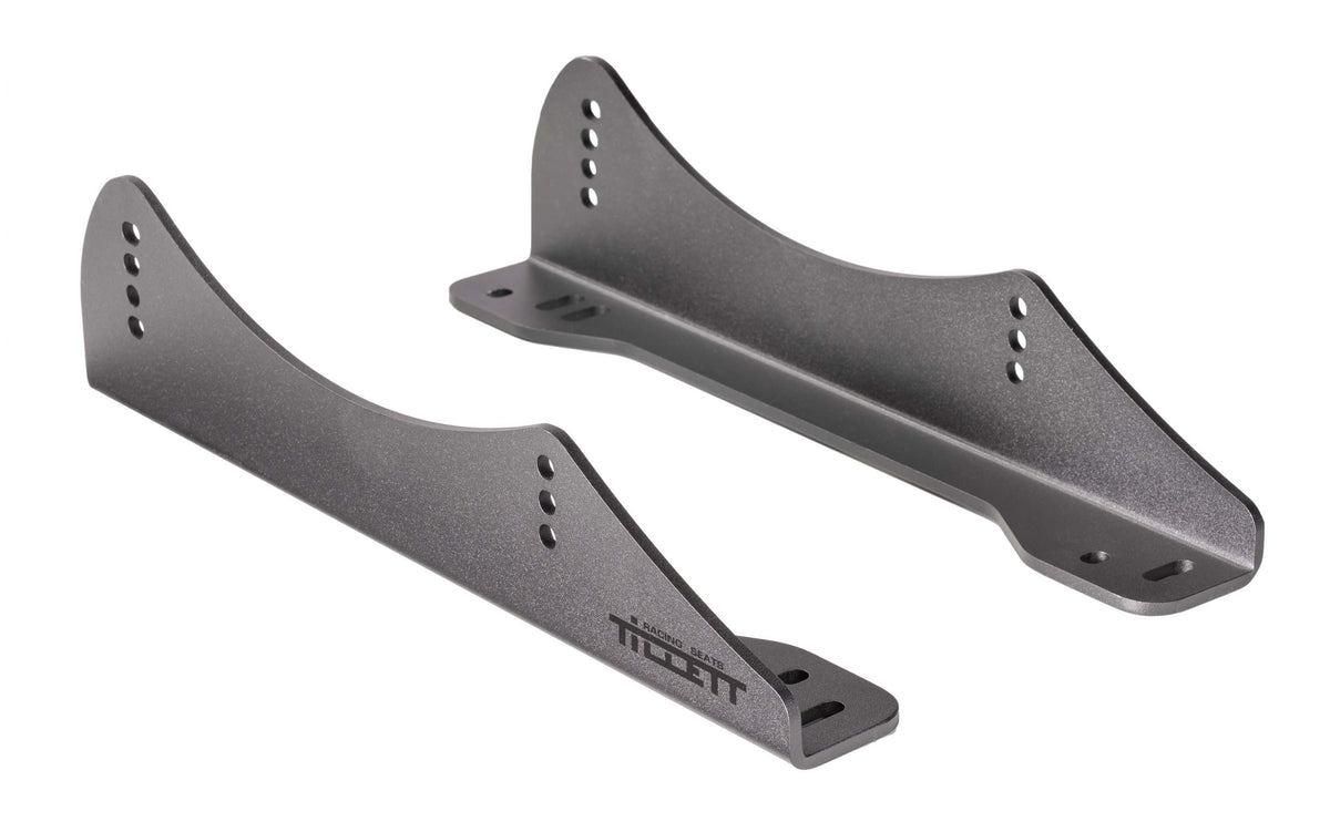 TILLETT TBB5 car seat bracket accessory shown in black, designed for secure attachment in racing or automotive applications.