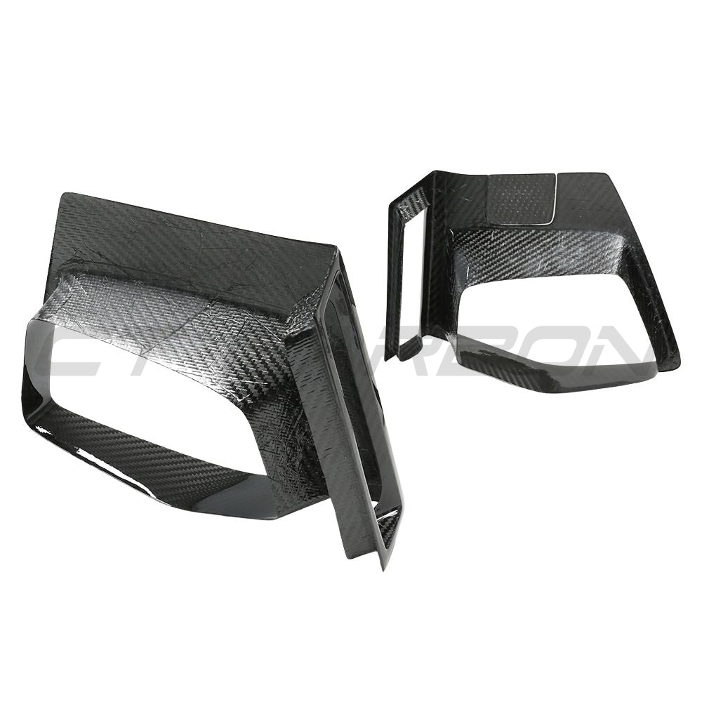 BMW X3M/X4M F97/F98 LCI 2022+ CT Carbon front bumper middle trim in carbon fibre, showing close-up of textured, sleek automotive accessory.