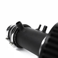 Ramair induction kit installed in a vehicle, showcasing the high-performance air intake system with branded tubing and filtration components.