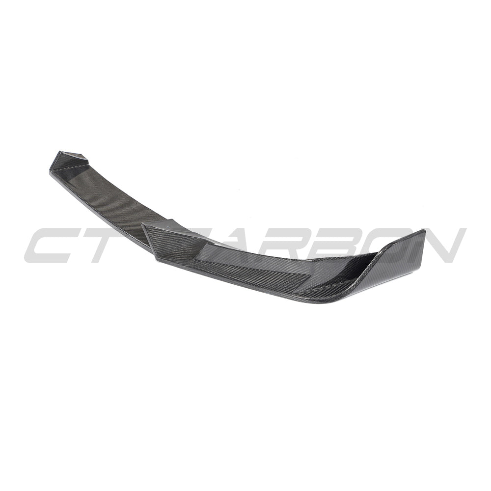 BMW G02 X4 and F98 X4M full carbon fiber kit by CT Carbon, showing detailed carbon fiber components on a modern vehicle.