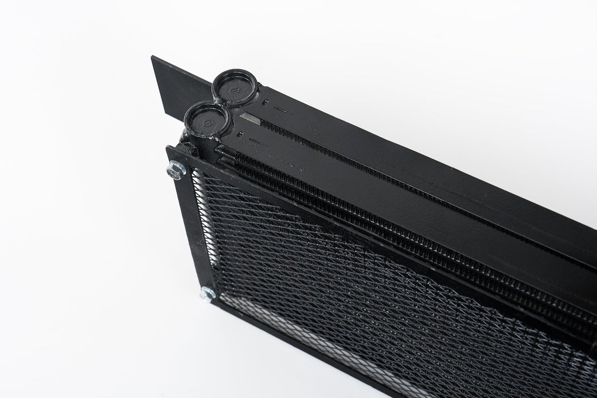 CSF BMW G8X M3/M4 ZF8 transmission oil cooler with rock guard, showcasing durable cooling component and protective guard.