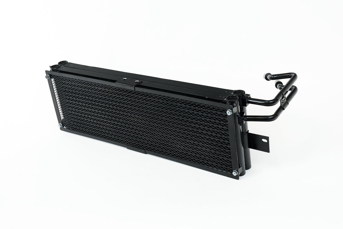 CSF BMW G8X M3/M4 ZF8 transmission oil cooler with rock guard, showcasing the compact cooling unit and protective guard.
