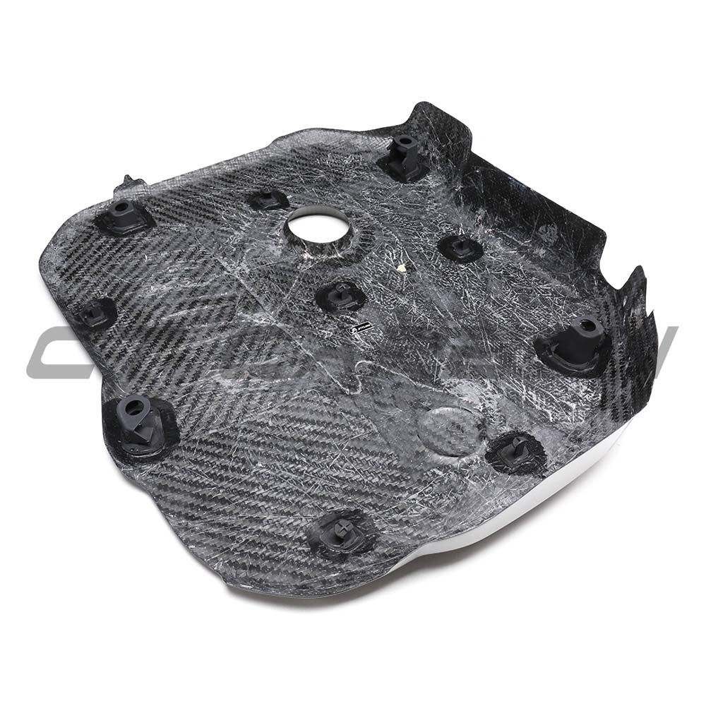 BMW G42 2 Series M240i 2022+ dry carbon fibre engine cover by CT Carbon, showcasing sleek, textured carbon fiber surface.