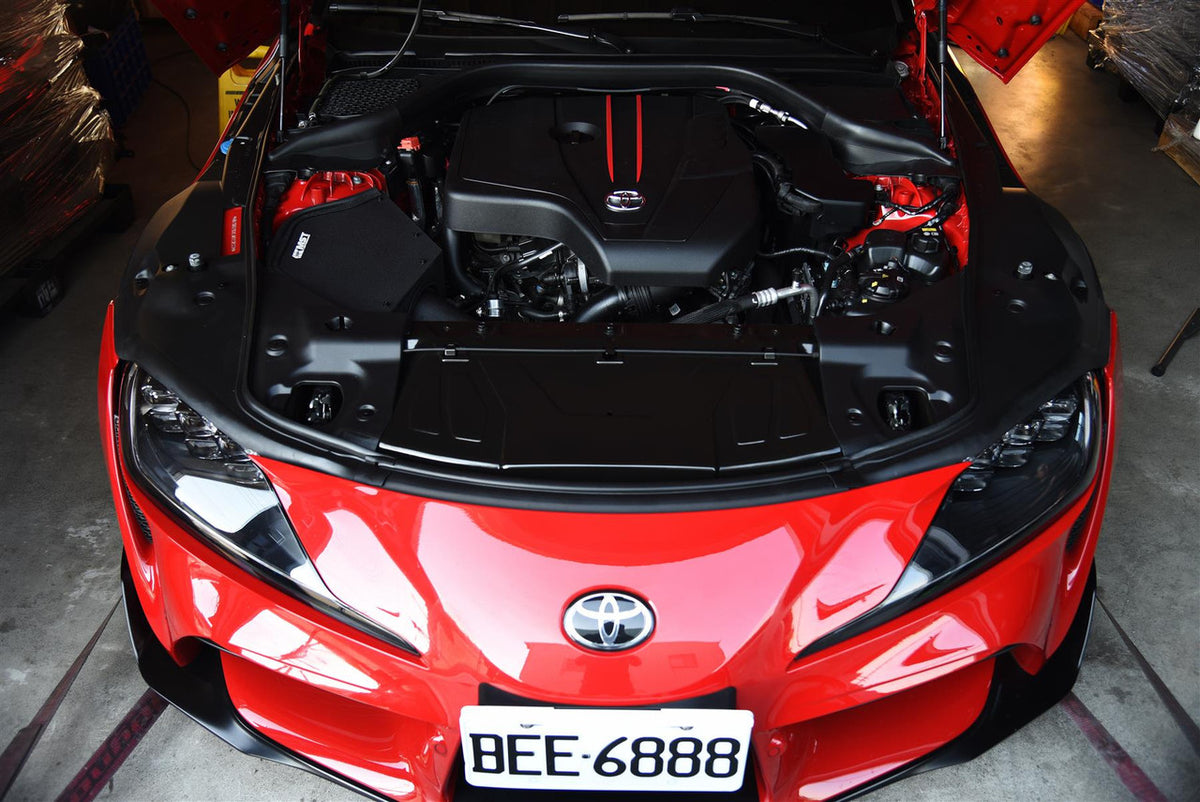 MST Performance induction kit and inlet for BMW 2.0 B48 Supra and Z4, showing the engine bay with the aftermarket intake components.