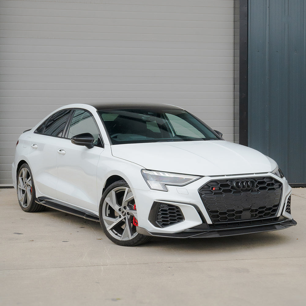 Audi A3/S3 8Y saloon full carbon fibre kit by CT Carbon, showing front and side view of sleek carbon fibre components.