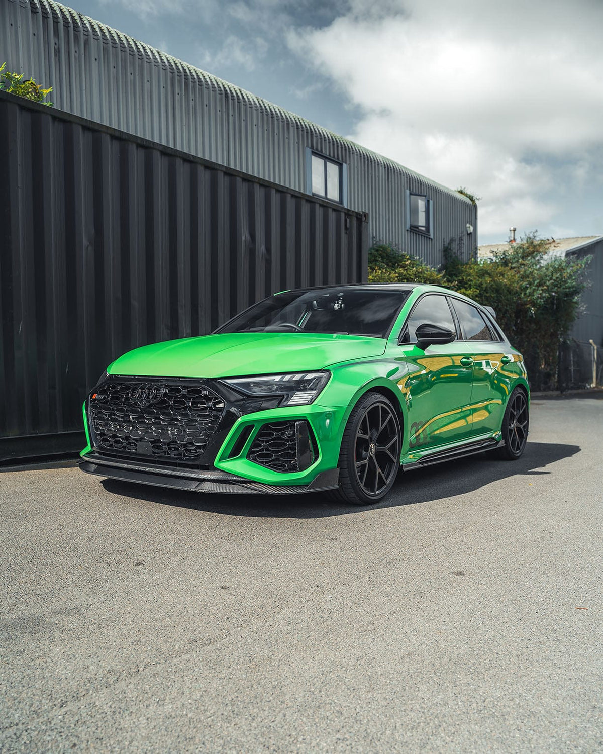 Full carbon fibre kit for Audi RS3 8Y Sportback 2022-2024 by CT Design, showing front and side view of the car with carbon details.