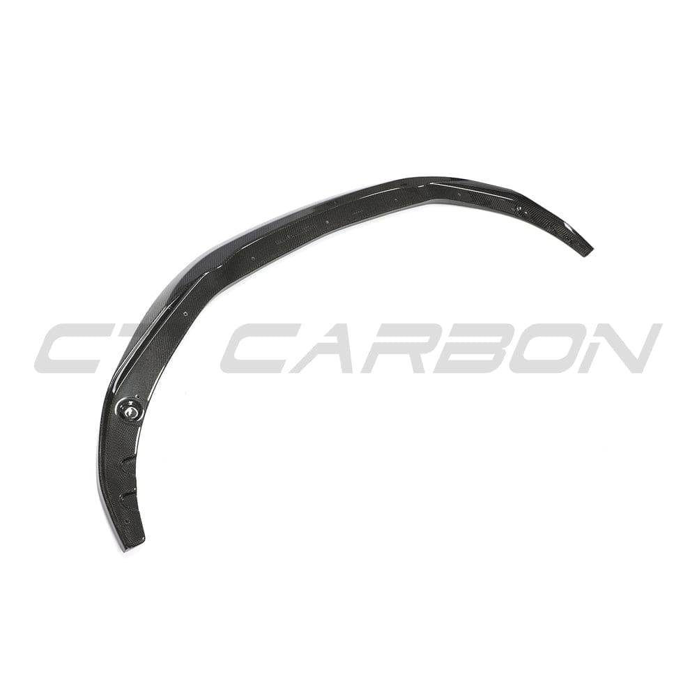BMW G22 4 Series carbon fibre kit including splitter, V10 style, by CT Carbon, showcasing sleek black carbon fibre with textured finish.