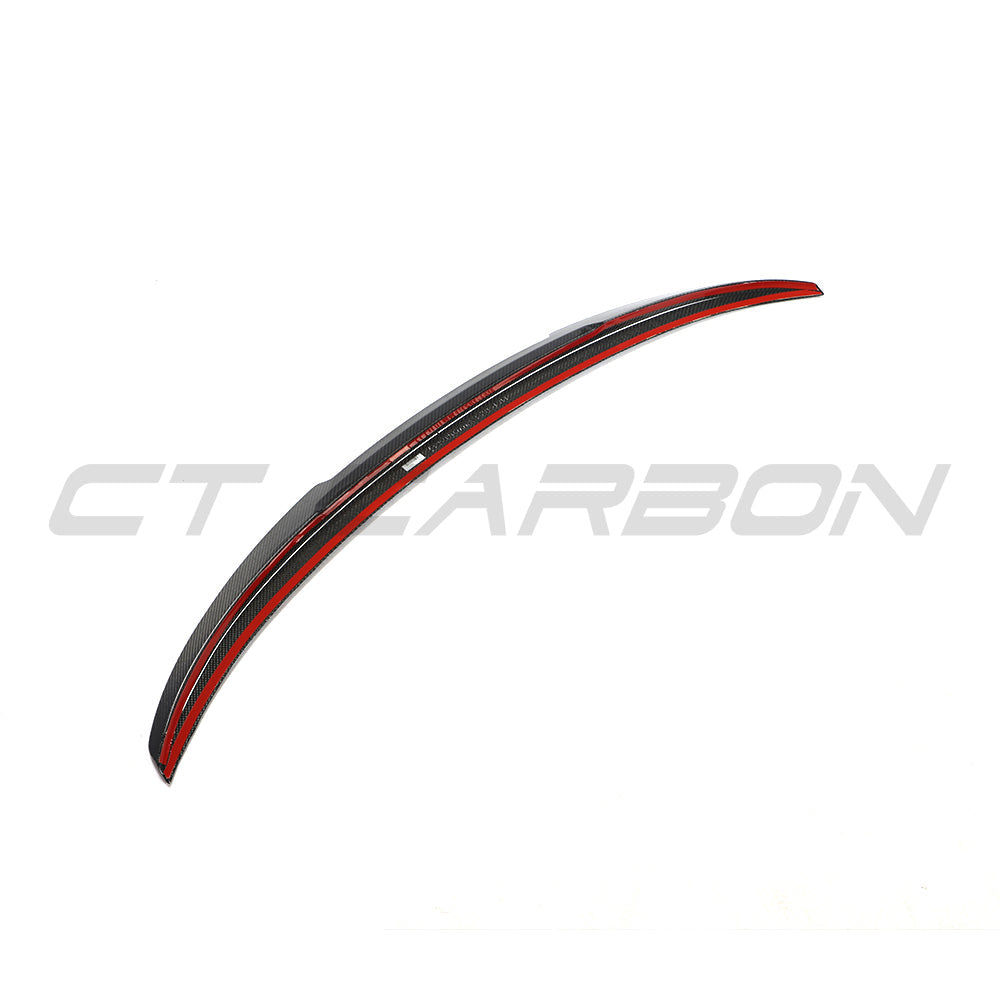 BMW 4 Series G26 and i4 carbon fibre spoiler by CT Carbon, V2 style, showcasing sleek aerodynamic design on the car.