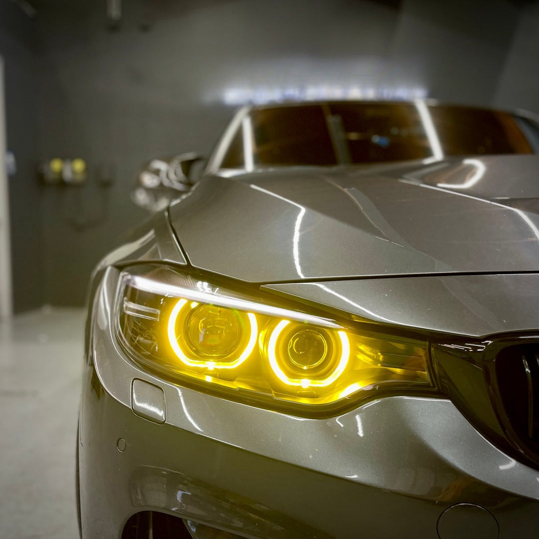 BMW F80 F82 M3 M4 pre-LCI yellow xenon DRL module set by CT Carbon, showing the LED daytime running lights for 2014-2017 models.