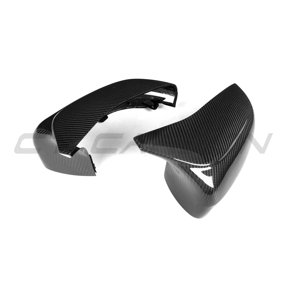 BMW F90 M5 2018-2023 pre-preg carbon fibre side mirrors for LHD models, featuring sleek carbon fibre finish and aerodynamic design.