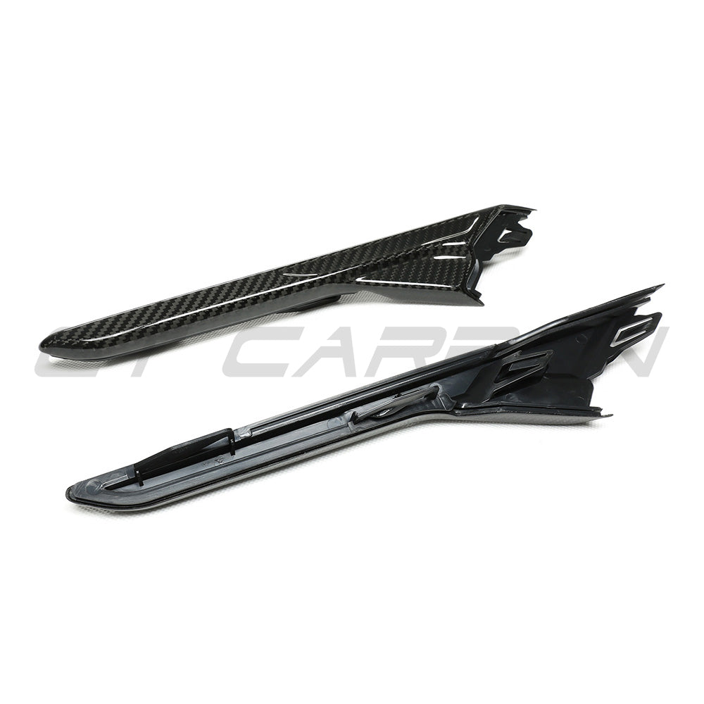 BMW F90 M5 M5 Competition carbon fiber fender trim accessory by CT Carbon, shown installed on the vehicle's front fender.