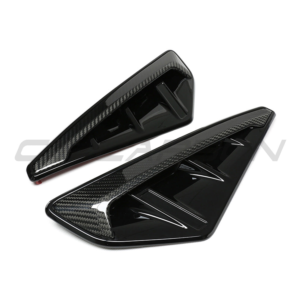 BMW F95 X5M 2019-2022 pre-LCI carbon fibre front fender trim by CT Carbon, close-up view of sleek automotive accessory.