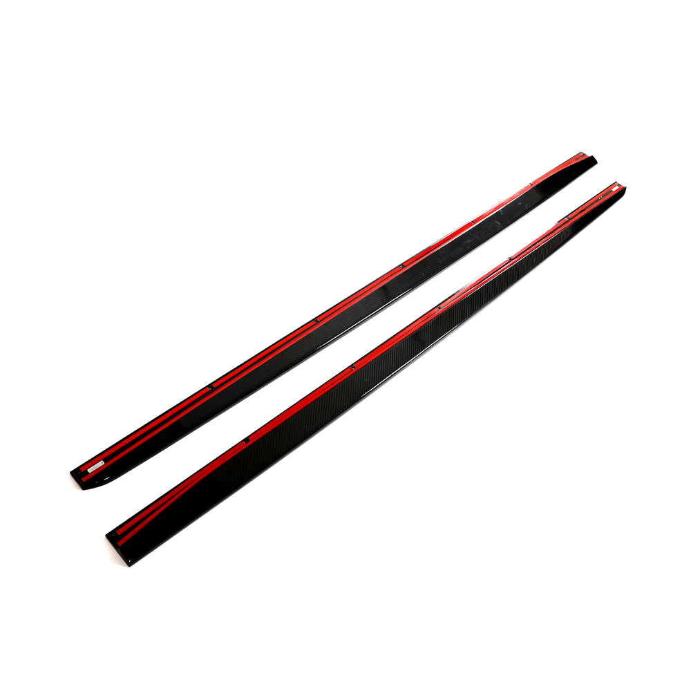 BMW G87 M2 carbon fibre side skirts by CT Design, showcasing sleek, lightweight aerodynamic enhancements on the vehicle.