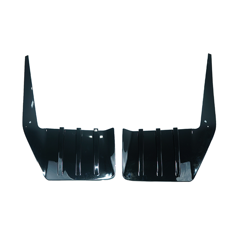 BMW G87 M2 glossy black rear bumper trim accessory by CT Carbon, showcasing sleek, high-quality car detailing.