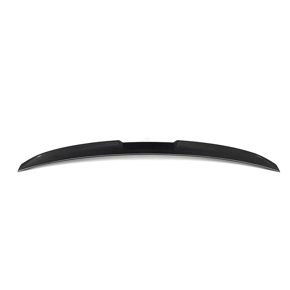 BMW G90 M5 and G60 5 Series 2023 carbon fiber spoiler by CT Carbon, shown on the car's rear with sleek, aerodynamic design.