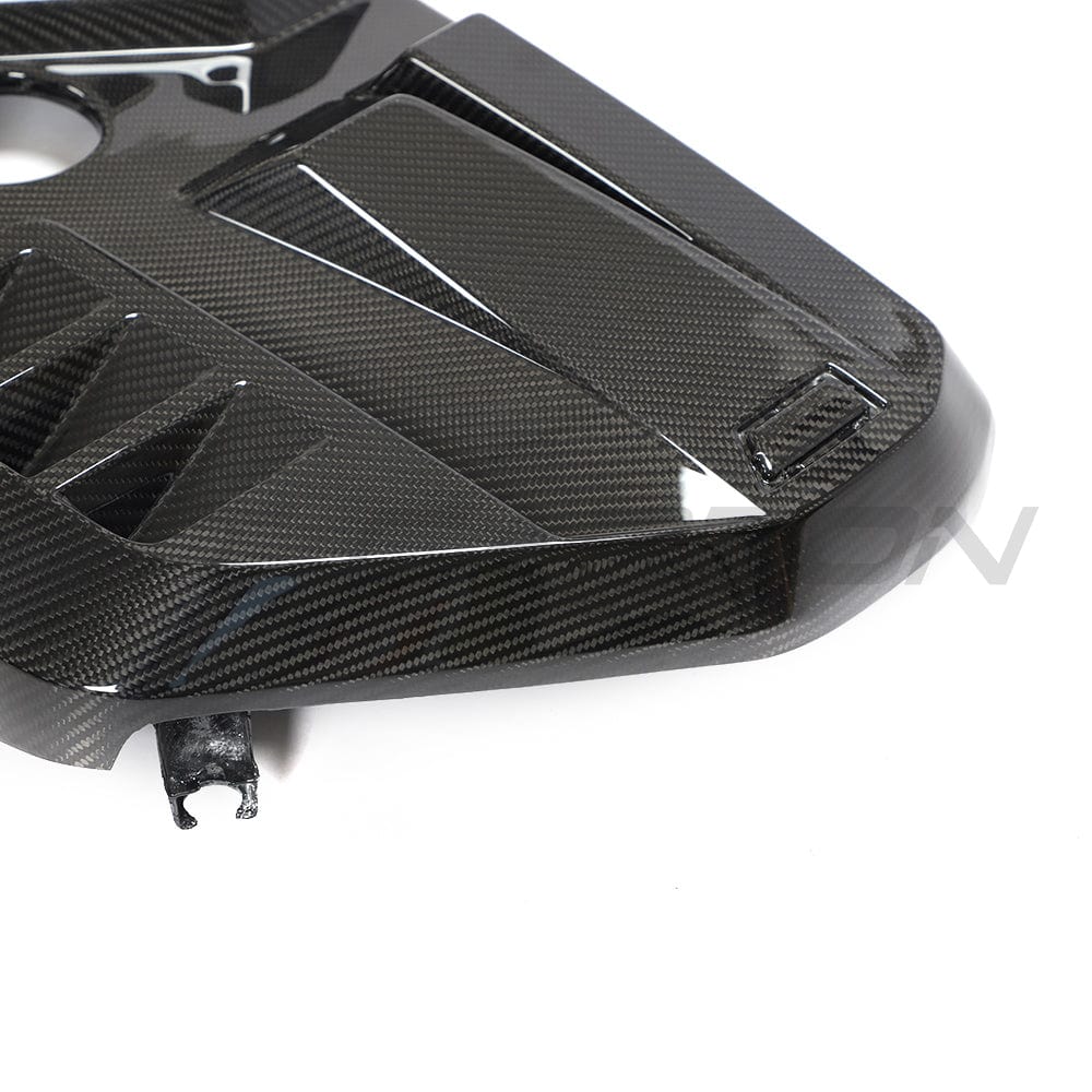 Carbon fibre engine cover for BMW M2, M3, M4 G87/G80/G81/G82/G83 by CT Carbon, showcasing lightweight, high-performance automotive accessories.