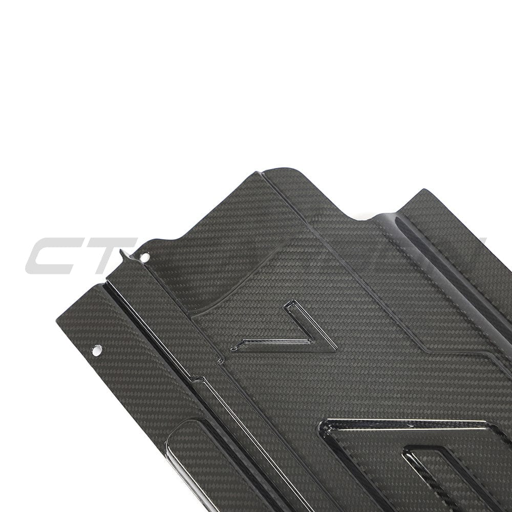 BMW M2, M3, M4 G87, G80, G81, G82, G83 Carbon Fibre Slam Panel Cover by CT Carbon, close-up view of the accessory.