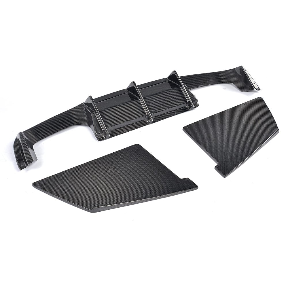 BMW M2/M2C F87 carbon fiber diffuser by CT Carbon, featuring sleek V4 design and lightweight carbon fiber finish.