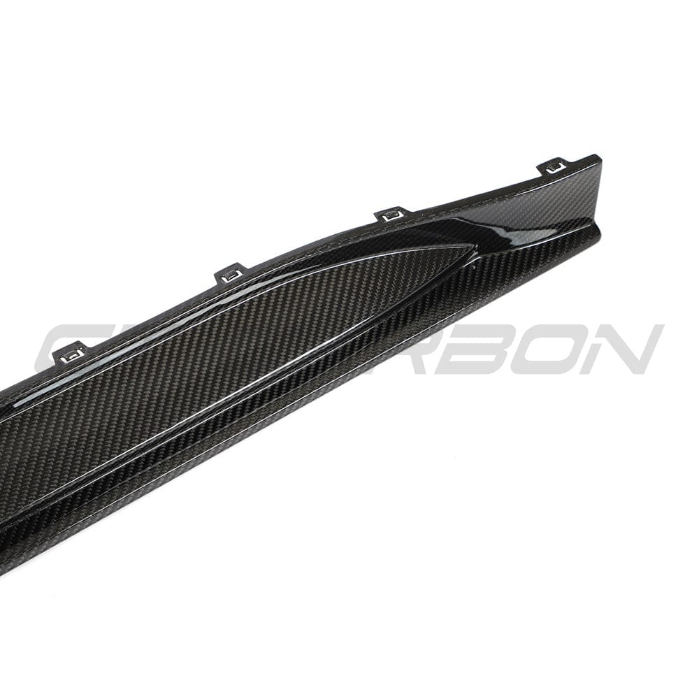 BMW G80 M3 full carbon fibre side skirt replacement kit by CT Design, showcasing sleek, lightweight carbon fibre construction.