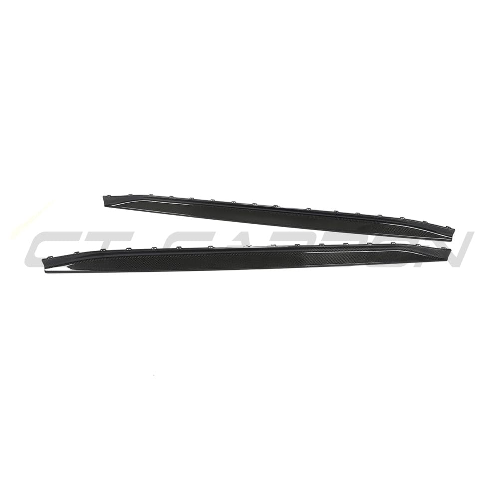 BMW M3 G80 G81 carbon fiber side skirt replacement by CT Carbon, showing the sleek, textured carbon fiber design on the side of the car.