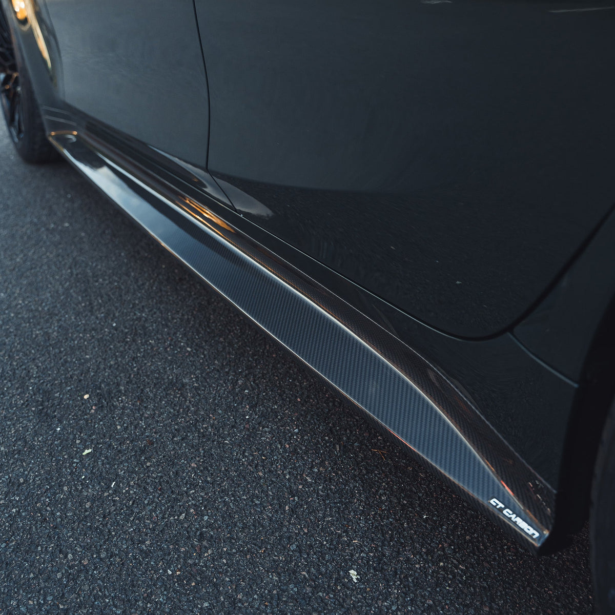 BMW M3 G80 G81 carbon fibre side skirt replacement by CT Carbon, showcasing sleek, lightweight side skirts for enhanced aerodynamics.