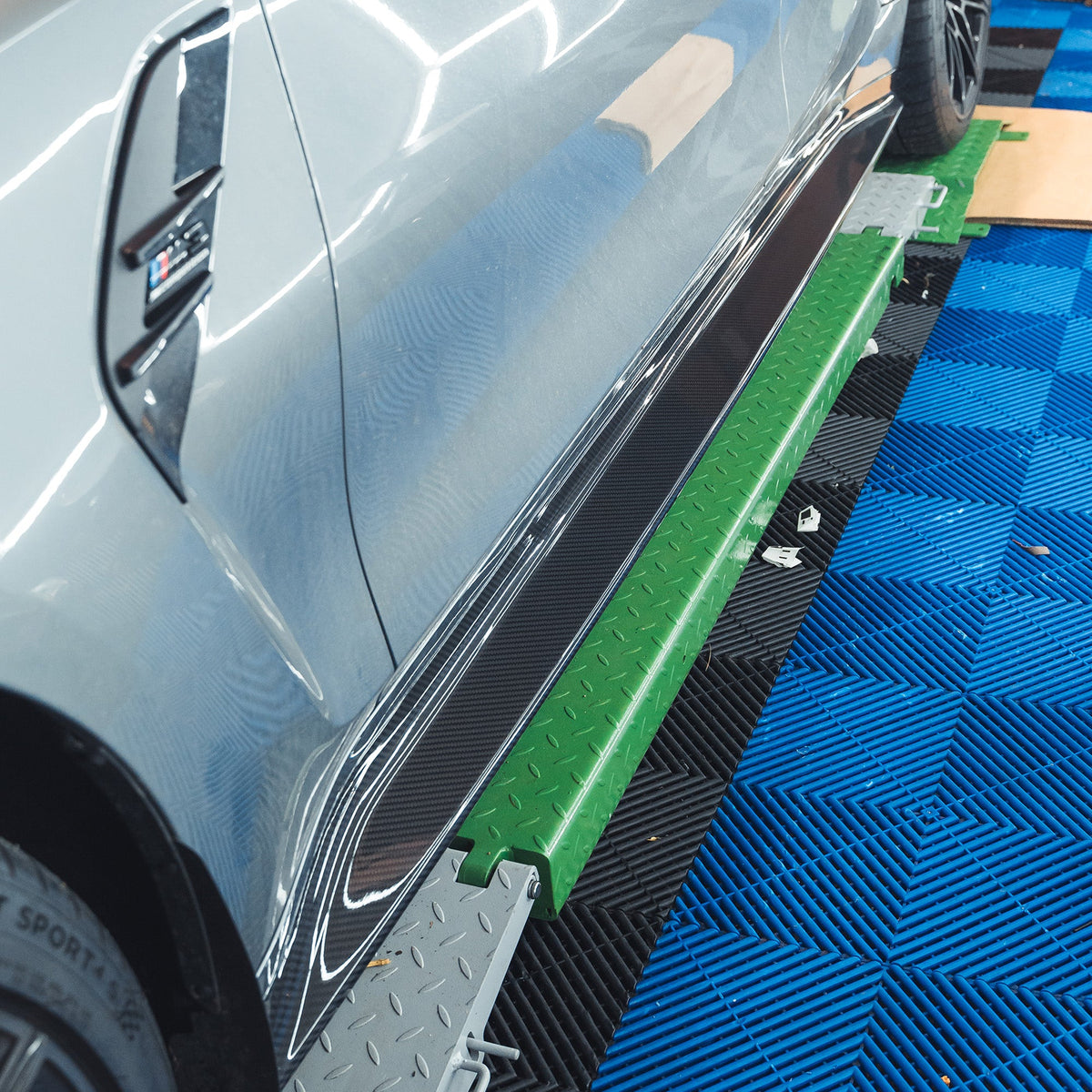 BMW M3 G80 G81 Carbon Fibre Side Skirt Replacement by CT Carbon, close-up view of sleek, lightweight side skirt design.