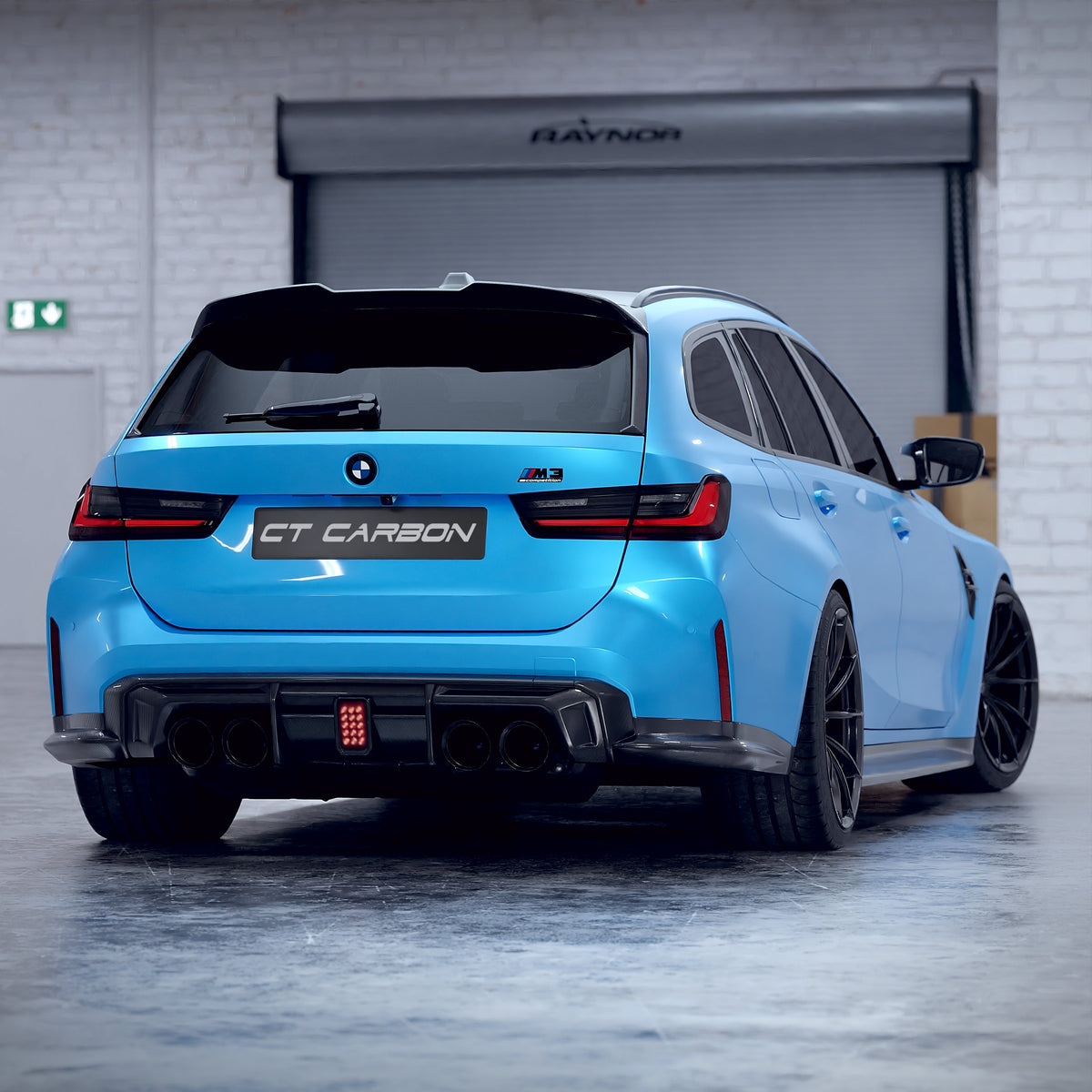 BMW M3 G81 carbon fibre spoiler by CT Design, showcasing sleek aerodynamic design on the car's rear.