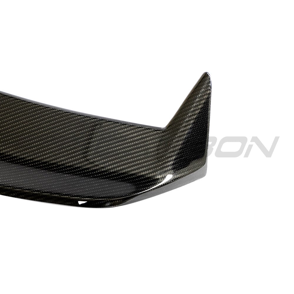 BMW M3 G81 carbon fibre spoiler by CT Design, V2 version, showing sleek aerodynamic design on the car.